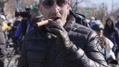 Howie Roseman smoking a cigar